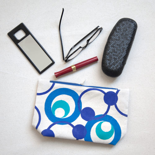 Blue and teal circles hand-printed cotton zipper pouch