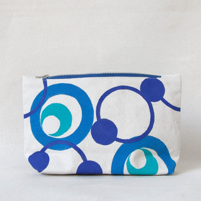 Blue and teal circles hand-printed cotton zipper pouch