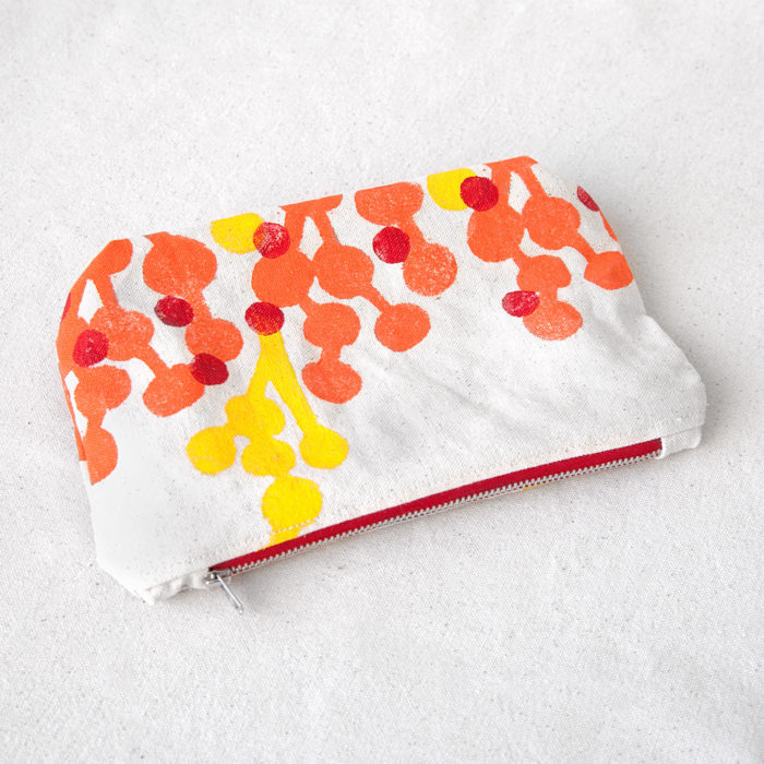 Orange and yellow berries hand-printed cotton zipper pouch
