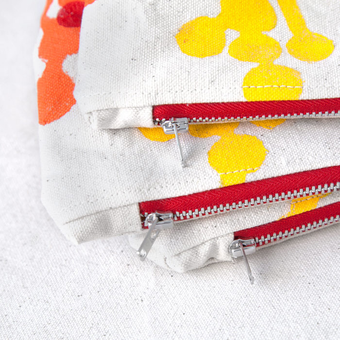 Orange and yellow berries hand-printed cotton zipper pouch