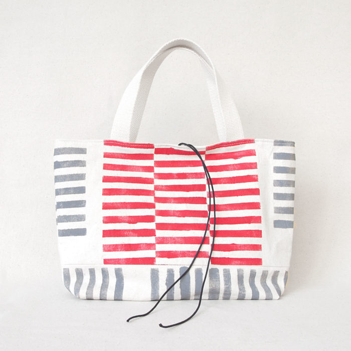 Red and gray lines hand-printed cotton handbag 1